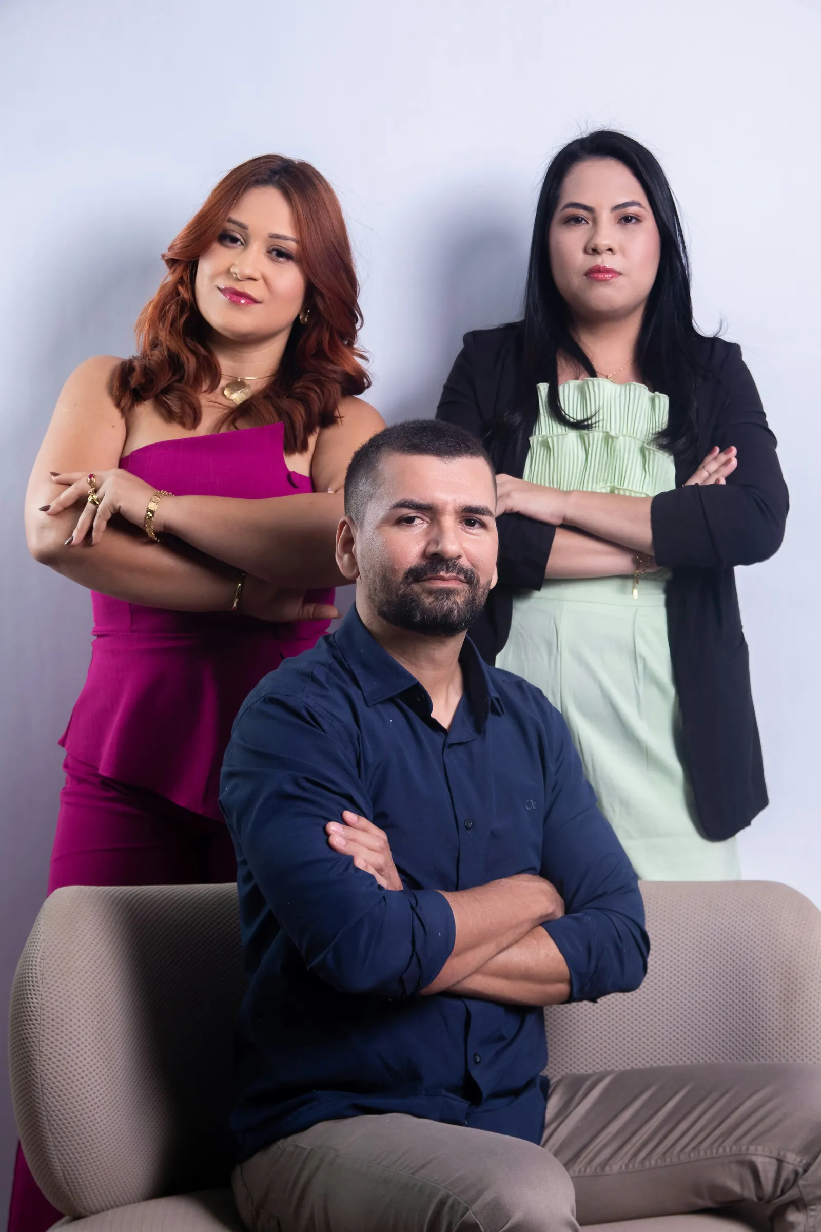 Dr. Marsh, Dr. Quintero and Dr. Ybarra together in the studio, arms crossed and smiling